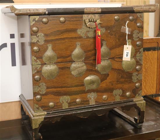 A Korean brass-mounted carved hardwood tansu, W 42in (max)